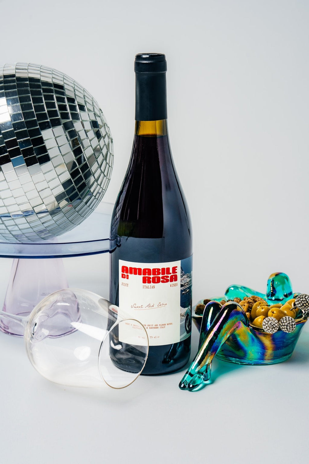 Amabile di Rosa Rosso styled with disco ball and snacks