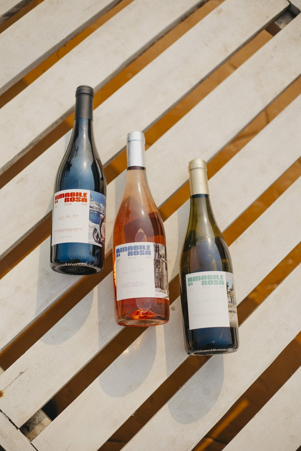 Amabile di Rosa bottles, overhead flat lay